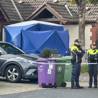 Na Gardaí ag fiosrú básanna fir agus mná i dteach i mBré