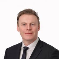 Ceapann Bord daa John Coleman ina Phríomhoifigeach Feidhmiúcháin
