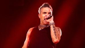 Lig dom siamsaíocht a thabhairt duit! Deimhníonn Robbie Williams dáta Pháirc an Chrócaigh