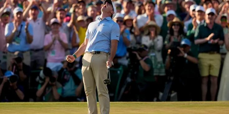 Crutha&iacute;onn Rory McIlroy stair le dh&aacute; bhua as a ch&eacute;ile sna Masters