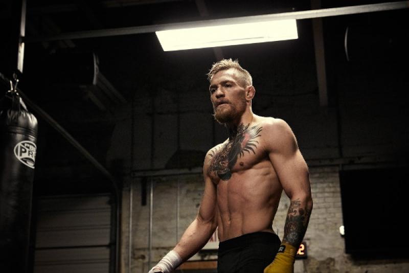 FÉACH: Tugtar Conor McGregor 'gobdaw' i ndíospóireacht Dála tar éis círéibeacha Bhaile Átha Cliath