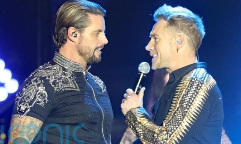 Tugann Keith Duffy ómós do dheartháir Ronan Keating tar éis bháis i dtimpiste