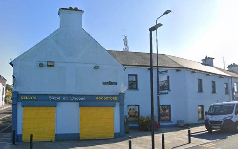 Seans go bhfeicfeadh siopa grósaeireachta dúnta i mbaile gnóthach saol nua mar chóiríocht aoi